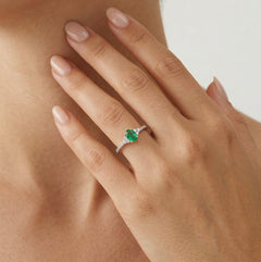 Yellow and white gold ring with diamonds and emerald