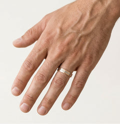 White and rose gold solitaire wedding ring