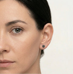 Minimalistic rose gold earrings with black diamonds