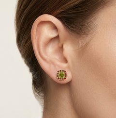 Eternal Radiance stud earrings in gold with moldavite and garnet