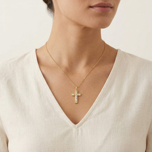 Kreuz aus Gold mit Linienmuster