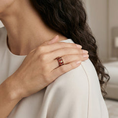 Stylish yellow gold ring with garnets