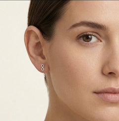 Boucles d’oreilles infini en argent avec zircons cubiques