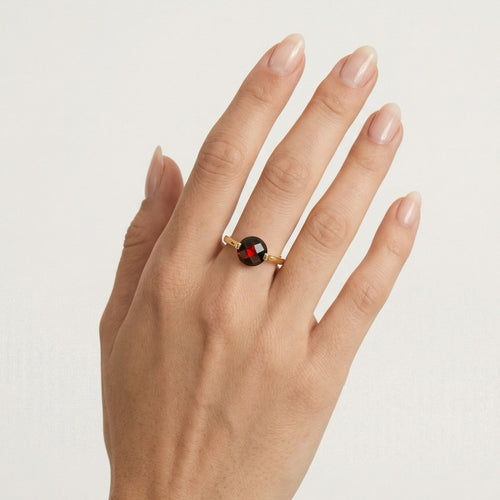 Rund geschliffener Granat-Solitär-Ring aus Gelbgold