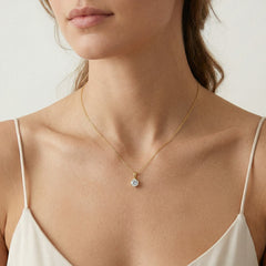 Six prong gold pendant