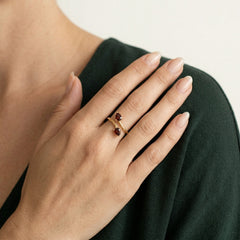 Leaf design ring with pear garnet