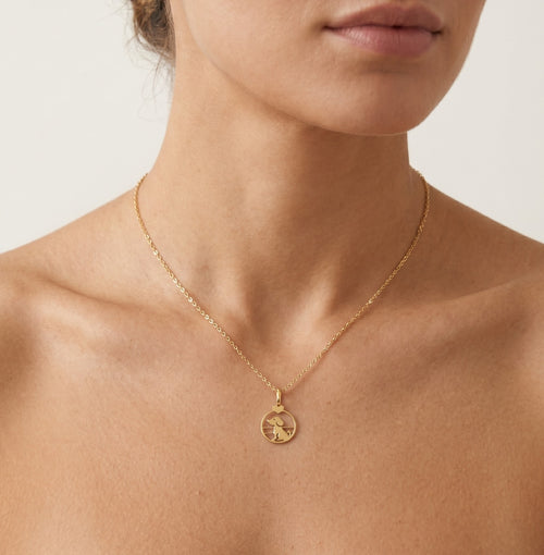 Pendente de oro con perro