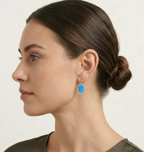 Masivní zlaté náušnice s kabošonským modrým opálem