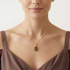 Royal Elegance Pendant In Yellow Gold With Pear Moldavite And Round Garnet