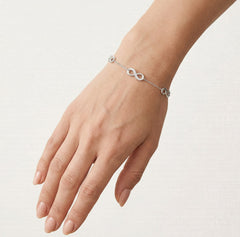 Sterling silver bracelet with three infinity symbols