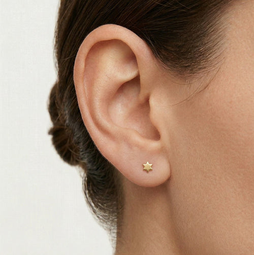 Lustrous star gold stud earrings