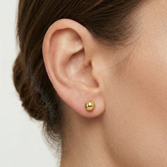 Půl kuličkové náušnice ze žlutého zlata