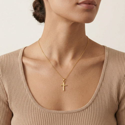 Simple yellow gold cross pendant