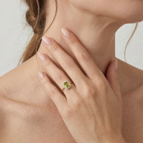 Radiant moldavite and cubic zirconia royal ring