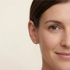 Lustrous yellow gold flower with cubic zirconia earrings