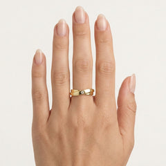 Bague torsadée en or avec une zircone cubique