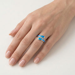 Kroucený prsten s modrým opálem