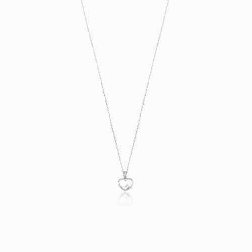 Goldenes Herz mit einem Diamanten im Inneren