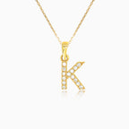 Colgante de oro letra "K" con circonitas