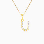 Zlatý přívěsek písmena "U" se zirkony