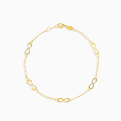 Jednoduchý zlatý náramek s více vzory nekonečna