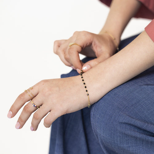Gold rosary bracelet with onyx
