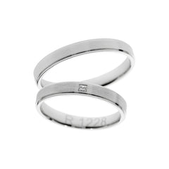 Bague de mariage en or blanc avec pierre taille princesse