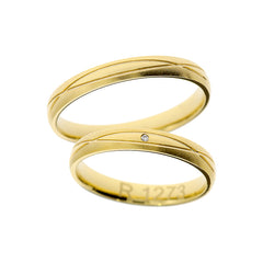 Bague de mariage élégante en or jaune avec lignes croisées