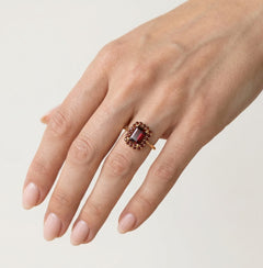 Harmony of shapes gold garnet ring