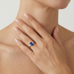 Stylish white gold ring with sapphire and diamonds