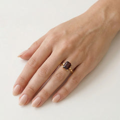 Elegant garnet emerald cut ring