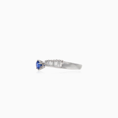 Blue sapphire and diamond baguette ring