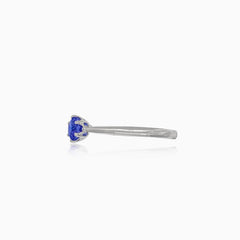 Simple white gold ring with tanzanite
