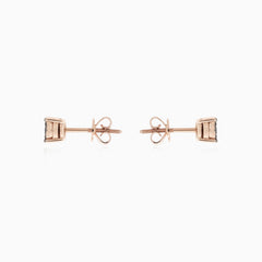 Minimalistic rose gold earrings with black diamonds