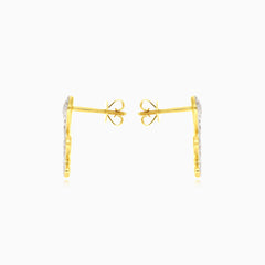 Puces d’oreilles serpent en or jaune avec diamant rond naturel