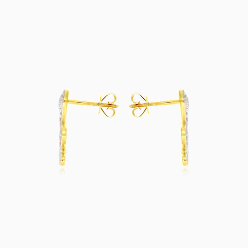 Puces d’oreilles serpent en or jaune avec diamant rond naturel