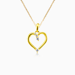 Colgante de corazón fino con cuatro circonitas cúbicas