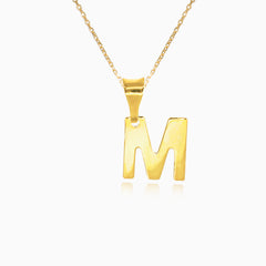 Pendente de oro con la letra M