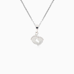 Delicate white gold baby feet pendant