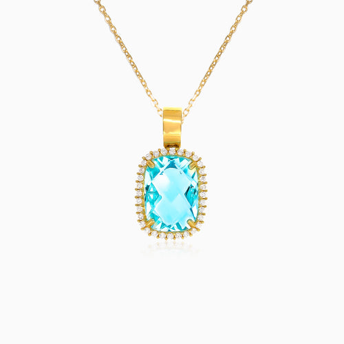 Přívěsek ze žlutého zlata s modrým topazem broušeným do polštářku