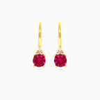 Boucles d’oreilles en or avec rubis et zircone cubique
