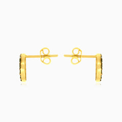 Yellow gold circle earrings with black onyx