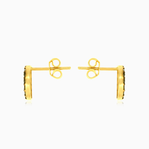 Yellow gold circle earrings with black onyx