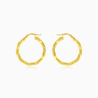 Boucles d'oreilles créoles en or jaune avec finition haute brillance