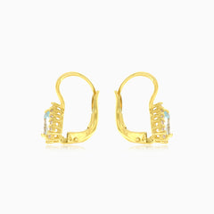 Náušnice s modrým topazem broušeného do hrušky ve žlutém zlatě