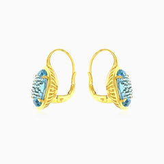 Pendientes de oro con topacio azul ovalado