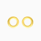 Boucles d'oreilles puces rondes en or jaune avec zircon cubique dans un cadre.