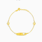 Bracelet en or avec accents floraux et plaque centrale