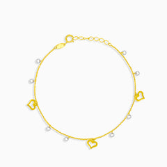 Kettenarmband mit herabhängenden Herzen und Steinen