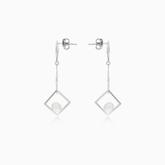 Unconventional silver earrings with pearl